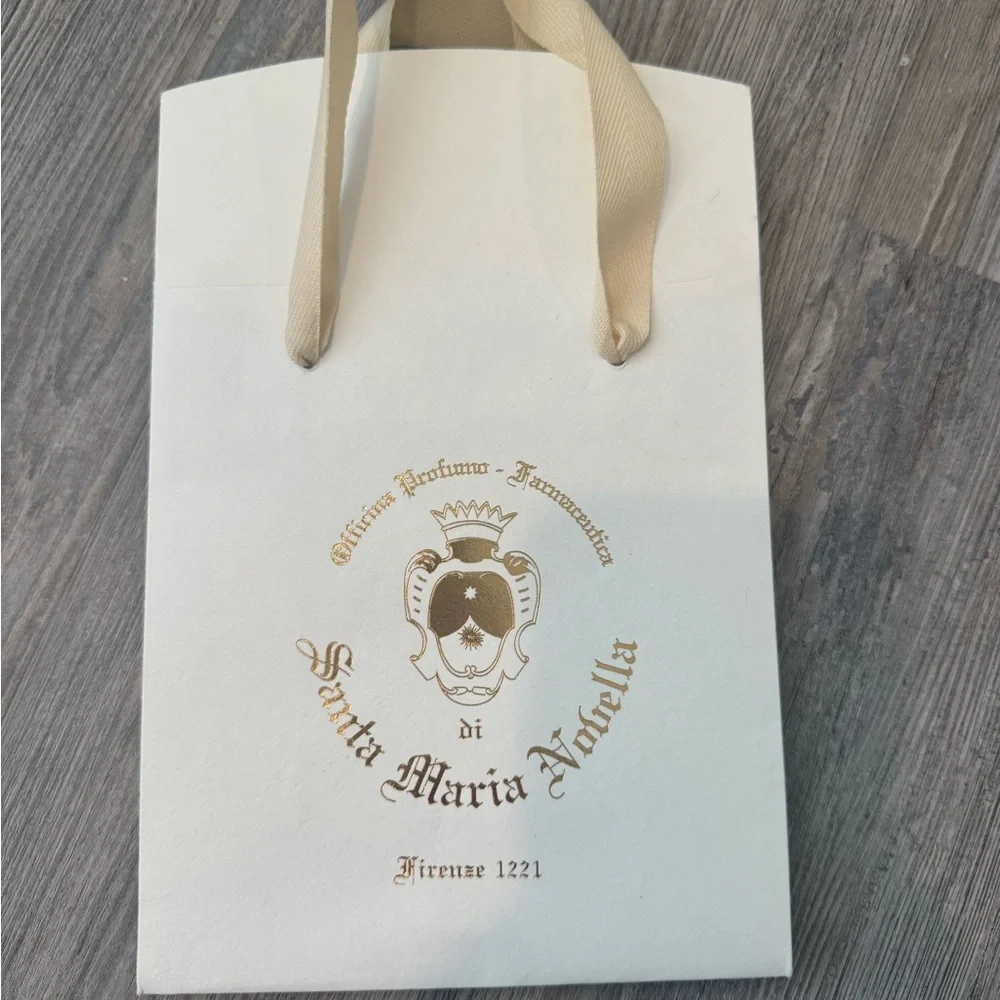 Chanel, Louis Vuitton, and Santa Maria Novella empty shopping bags - Picture 4 of 4